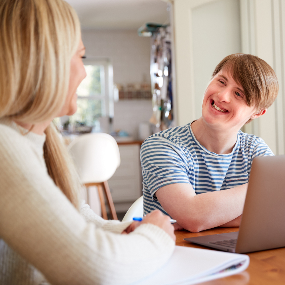 Boy holding tablet device and smiling