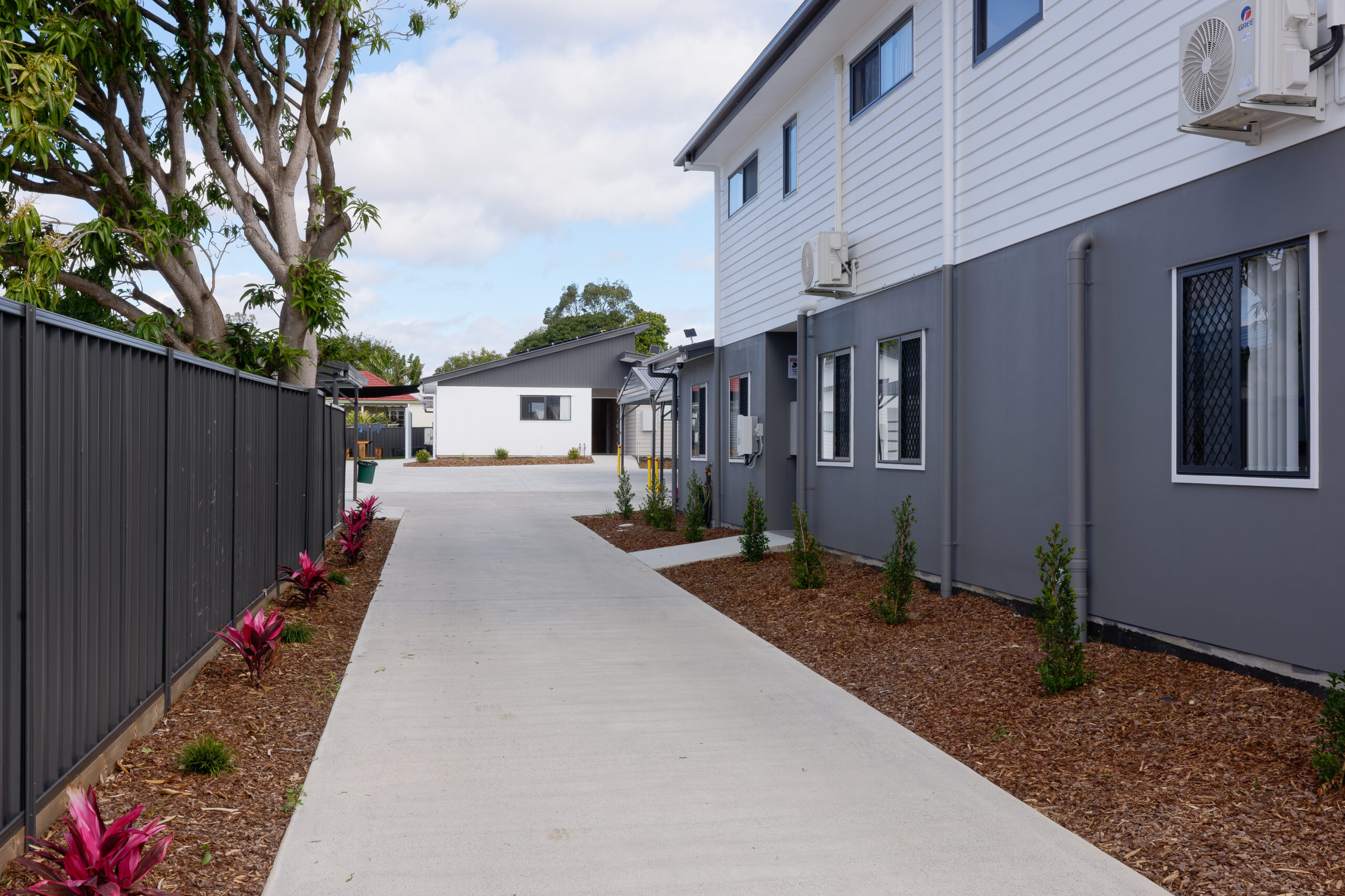 Pathway between units at Mi Casa Su Casa, Silkstone